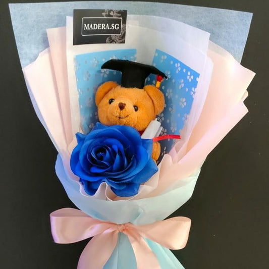 Little Graduation Brown Bear Hug Artificial Blue Rose Bouquet